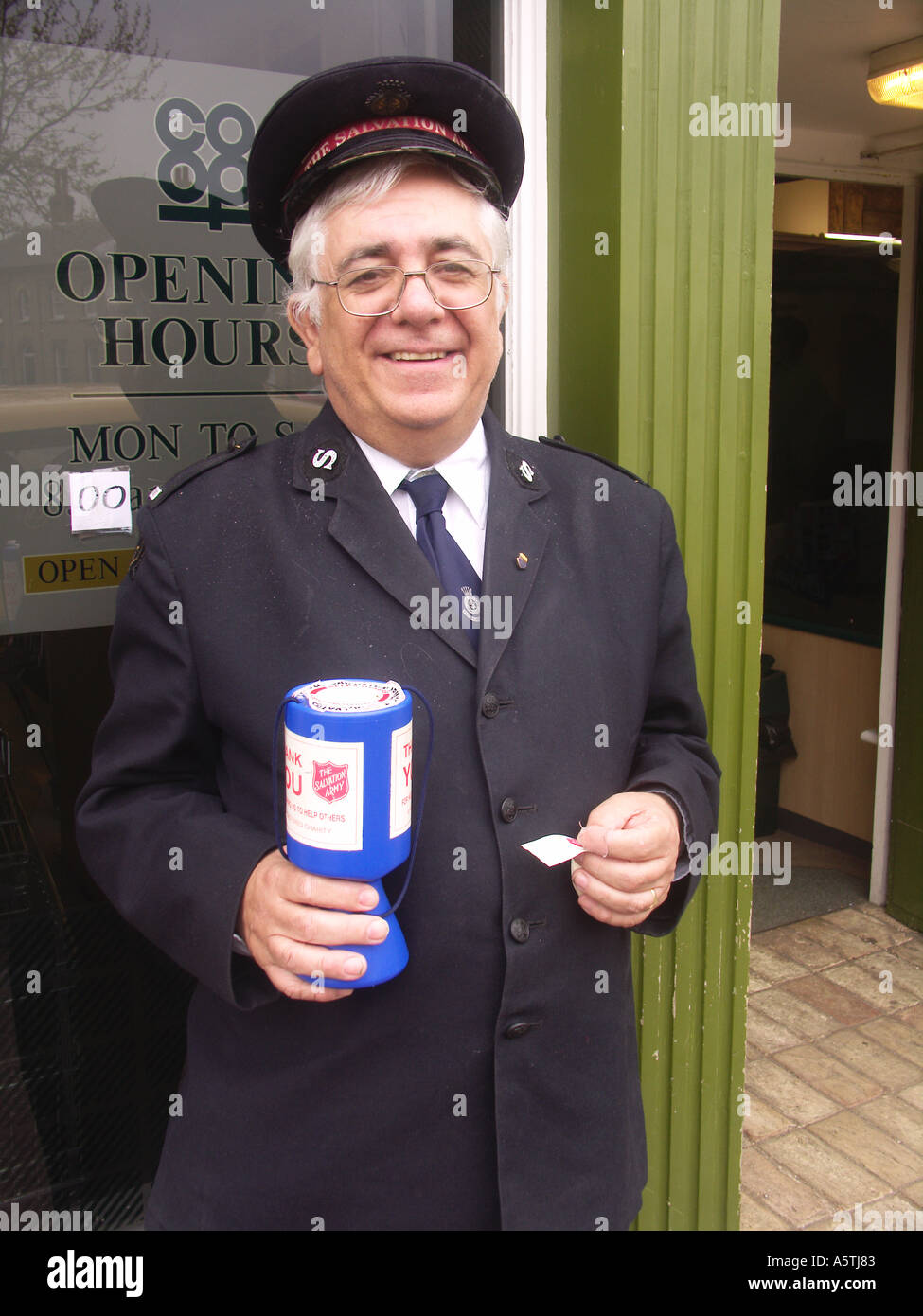 Salvation Army charity collector in UK street Stock Photo Alamy