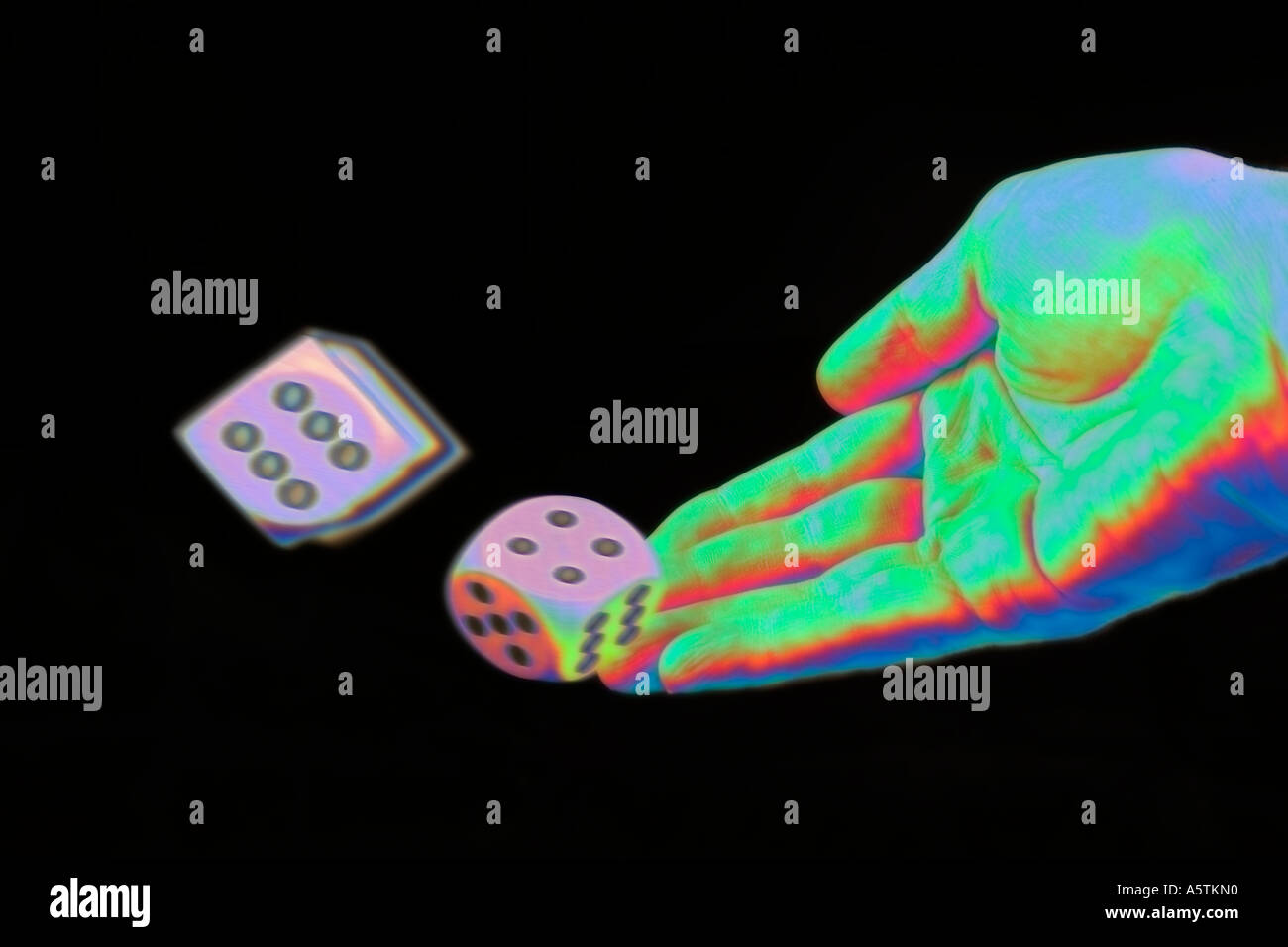 hand throwing dice rolling dice Stock Photo Alamy