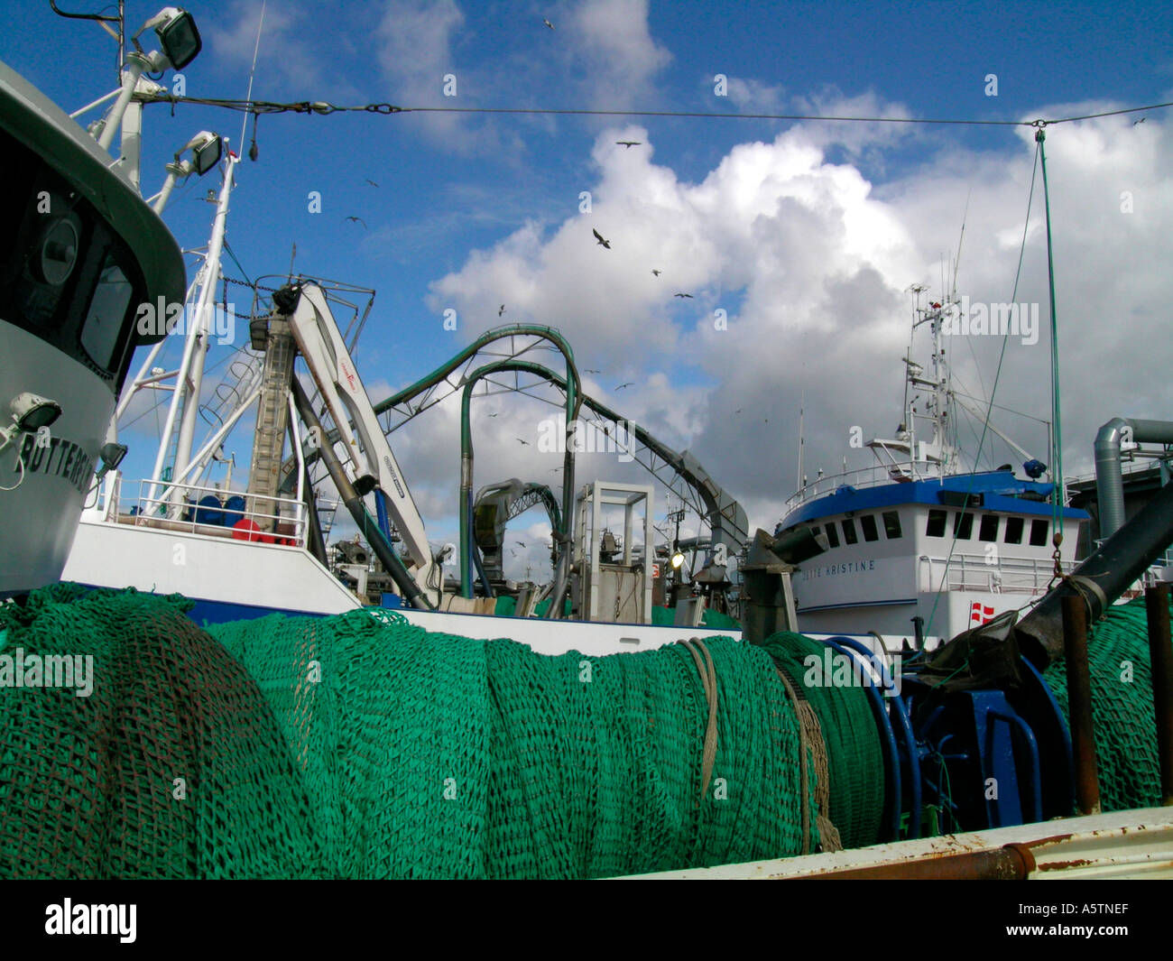 fishing cutters with trawl nets at the fisher port of Esbjerg in