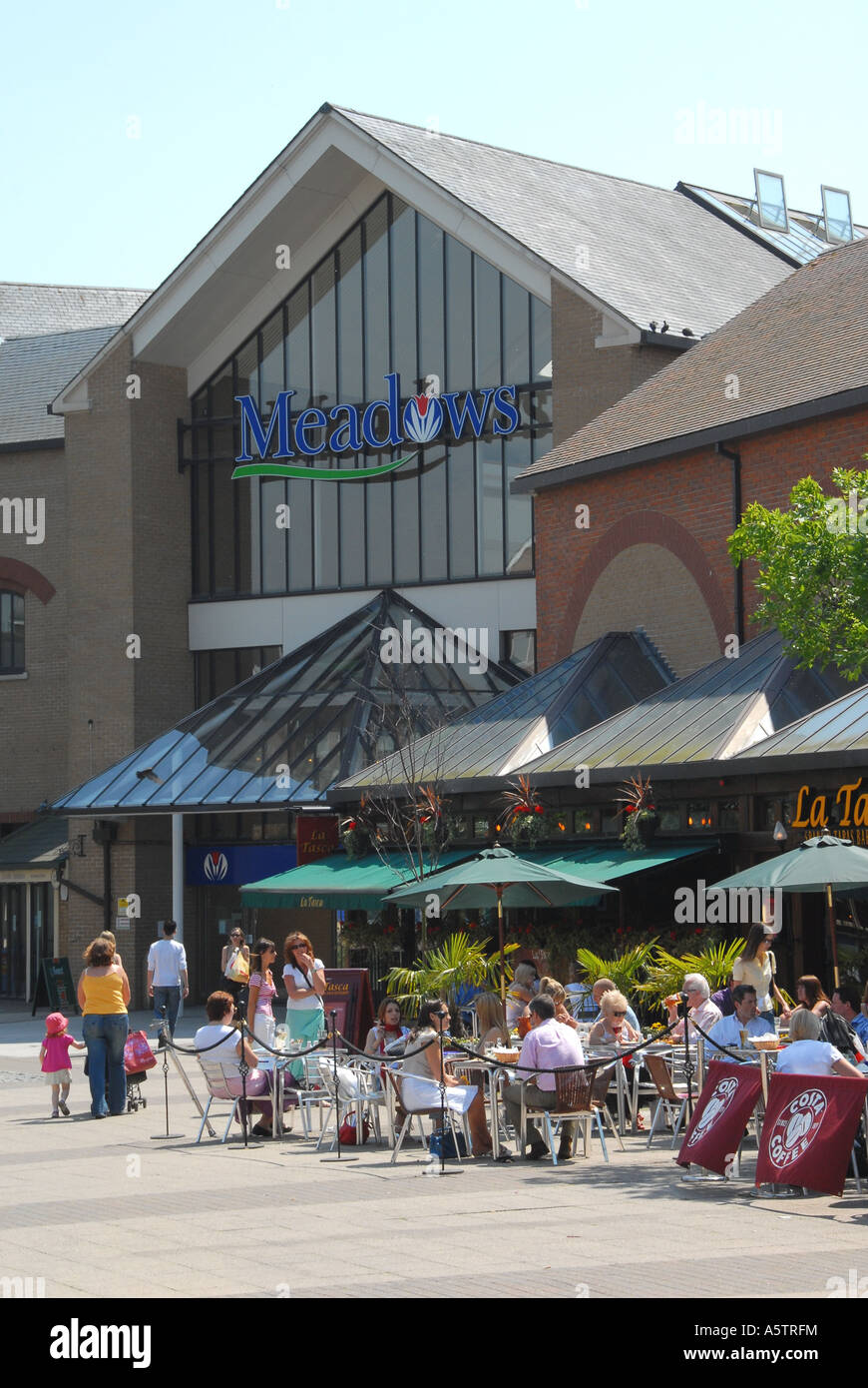 Customers at one of the outdoor restaraunt's by the Meadows shopping