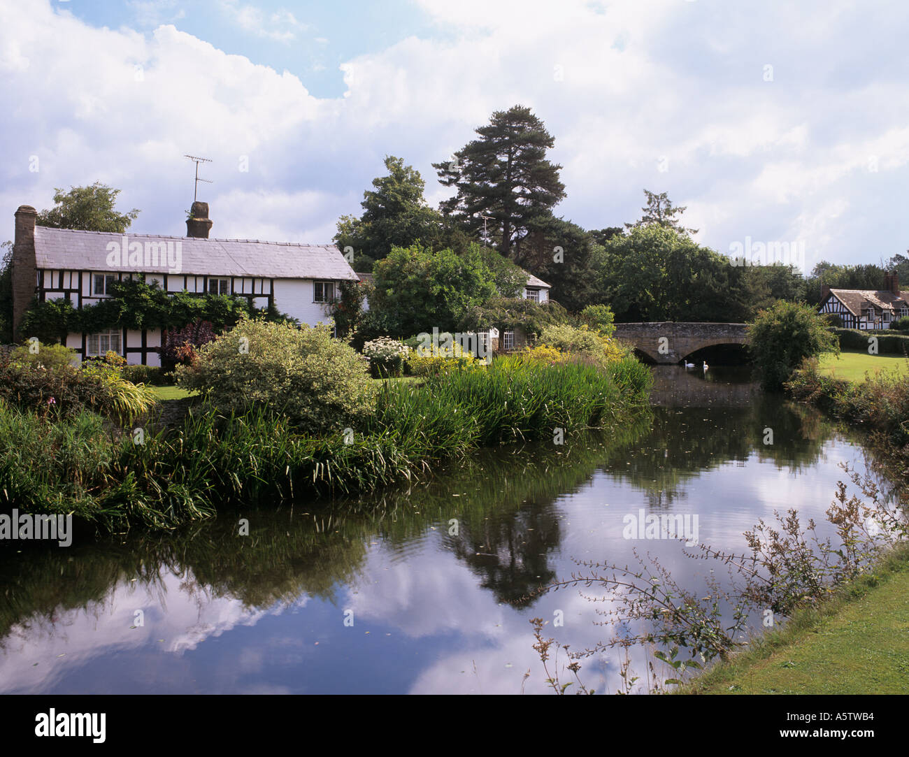 TIMBER FRAMED COTTAGES by STONE BRIDGE over the River Arrow Eardisland