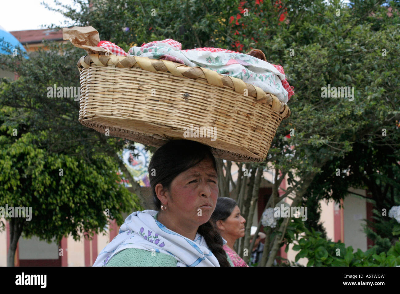 Painet jj1557 guatemala street seller carrying food head san pedro sacatepequez latin america central americas labor labour Stock Photo