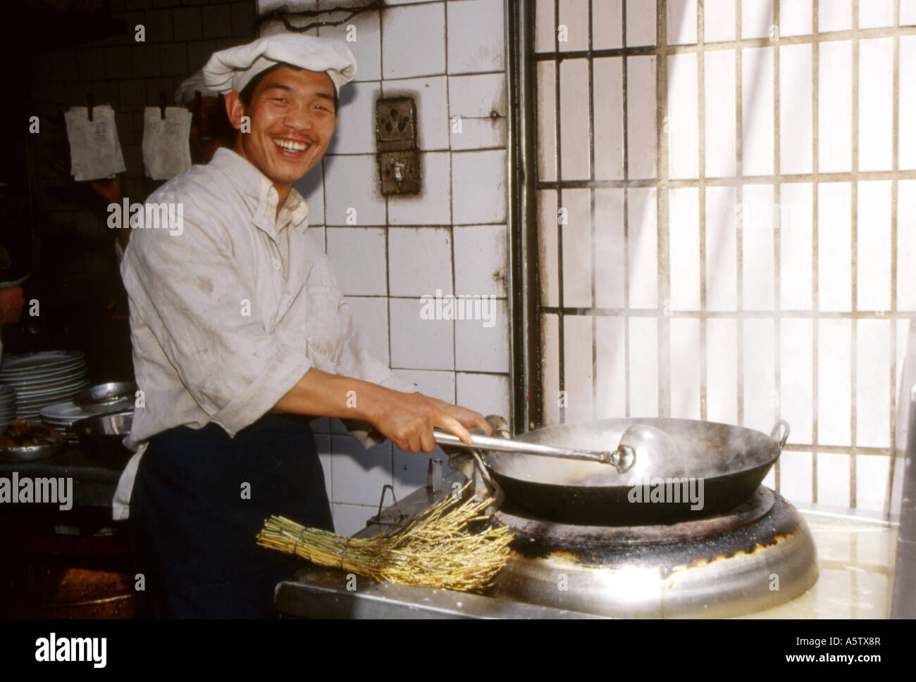 giant wok cooking Stock Photo