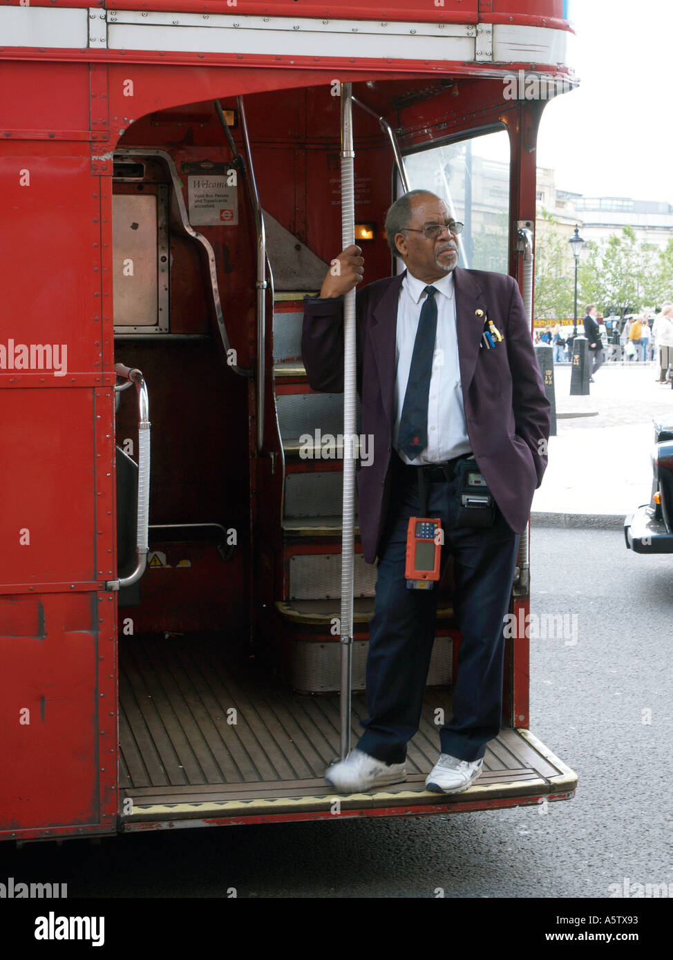bus conductor London Stock Photo