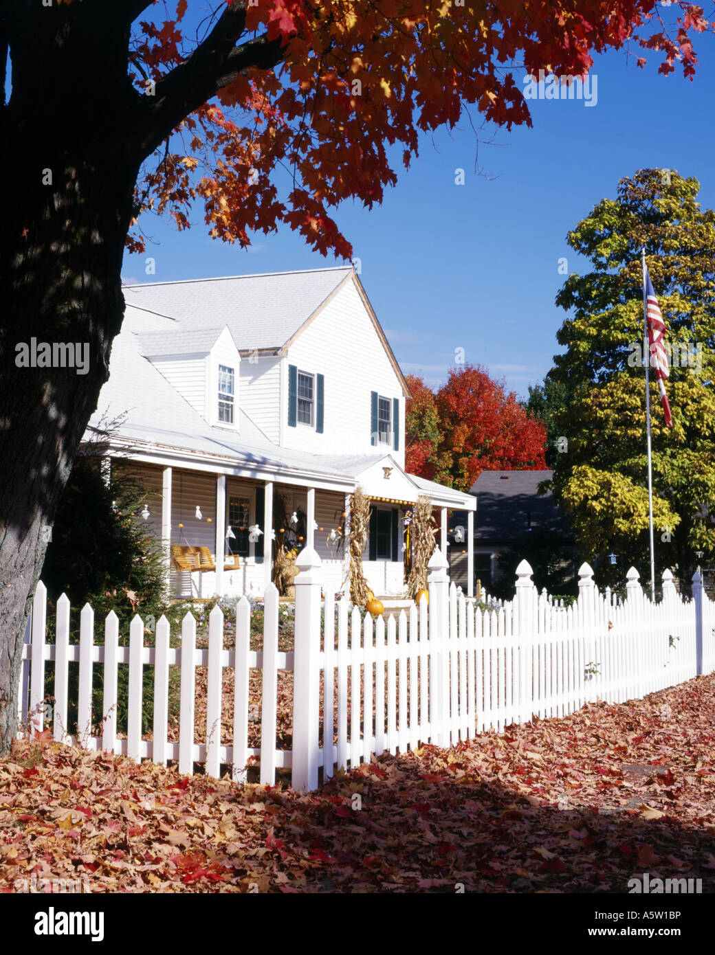 traditional white clapboard house surrounded by autumn foliage concord massachusetts usa Stock Photo