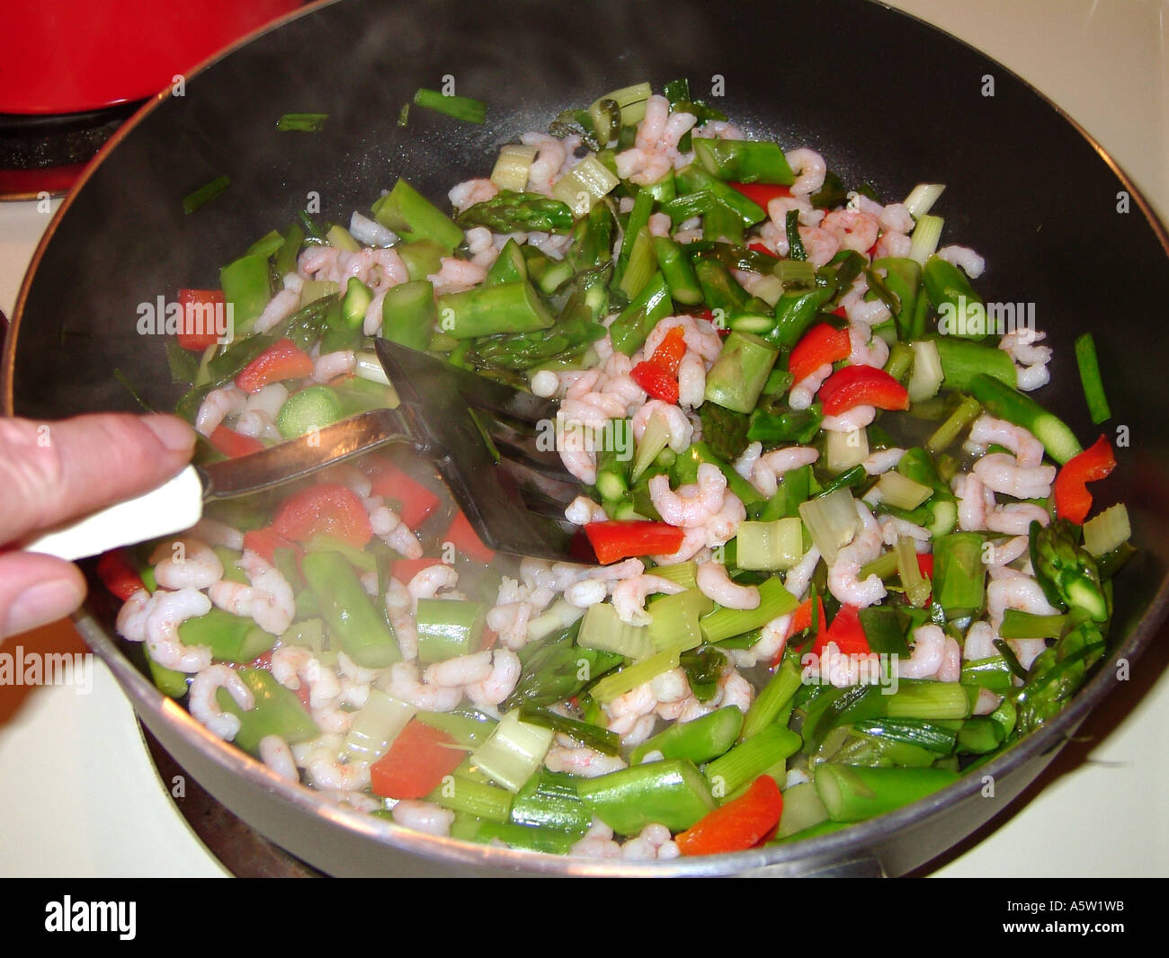 Stir-fry with vegetables and tiny shrimp. Stock Photo