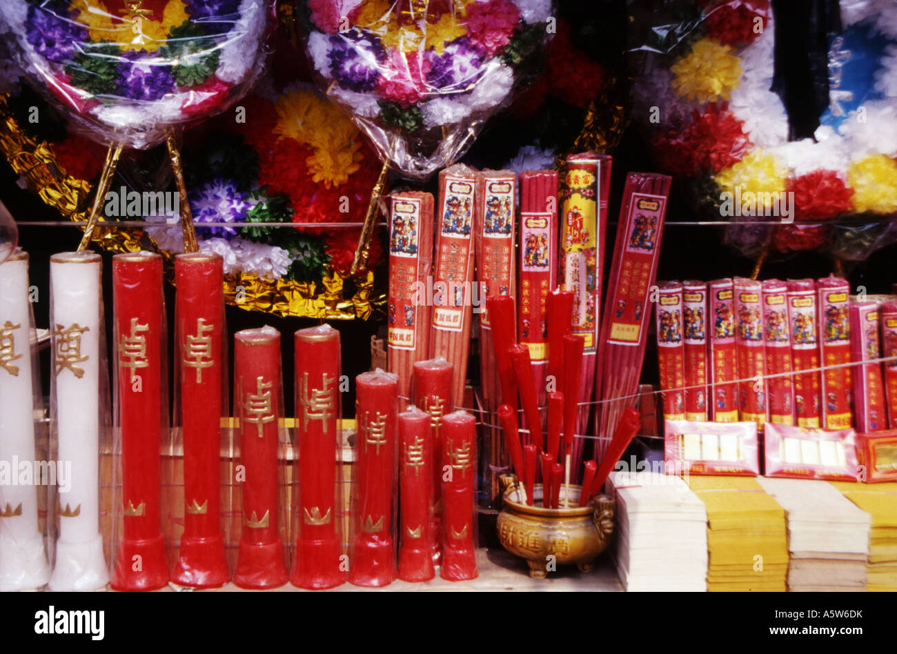 Bright red packets of incense sticks for sale at a shop in Beijing,China. Stock Photo