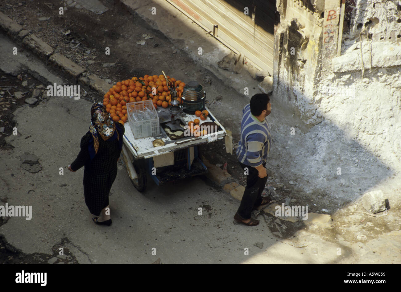 Lebanon Beirut In April 1994 After The Civil War Above A Fruit Seller And A Muslim Woman Stock Photo