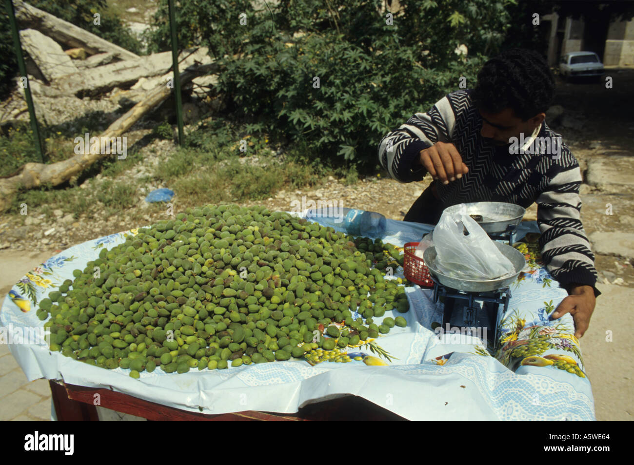 Lebanon Beirut In April 1994 After The Civil War A Street Seller Serving Almonds Stock Photo