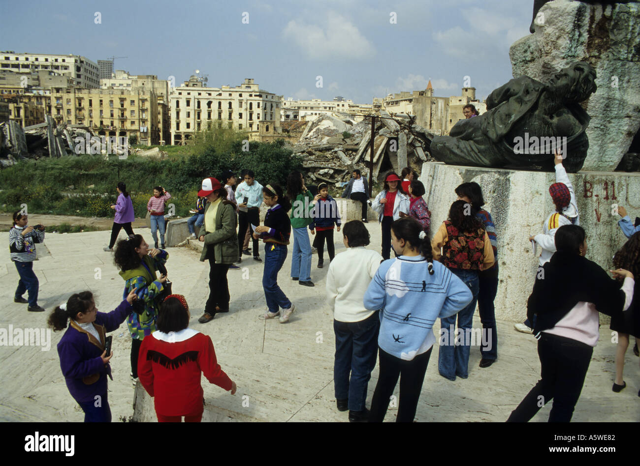 Lebanon Beirut In April 1994 After The Civil War Group Of Young Students Visiting The Destroyed Martyrs Place Stock Photo