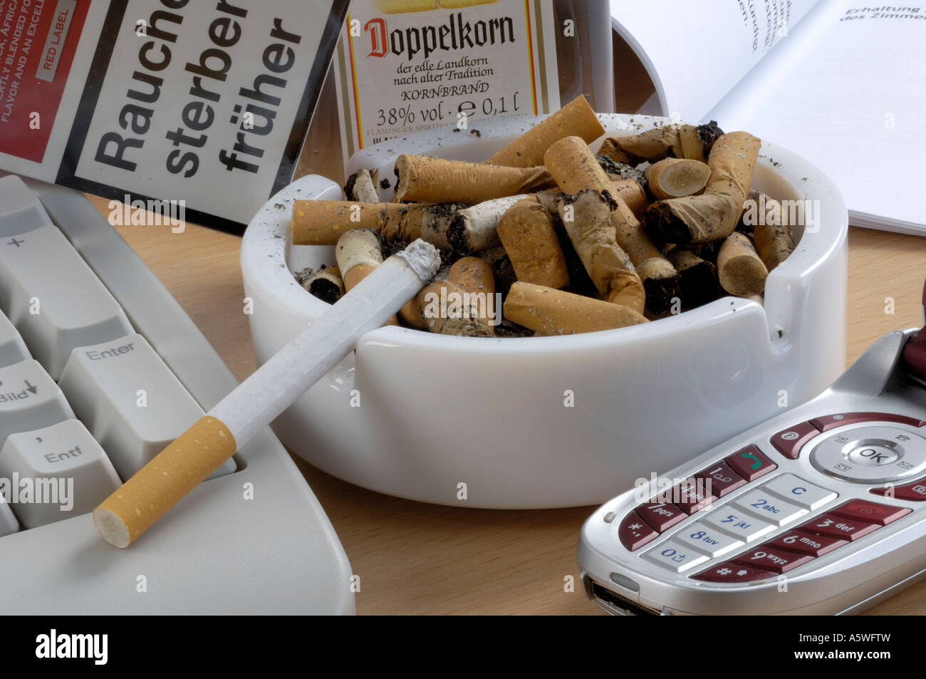 Ashtray on desk Stock Photo Alamy