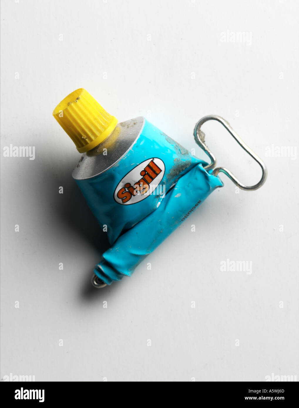 tube glue squash crush squeeze Stock Photo Alamy