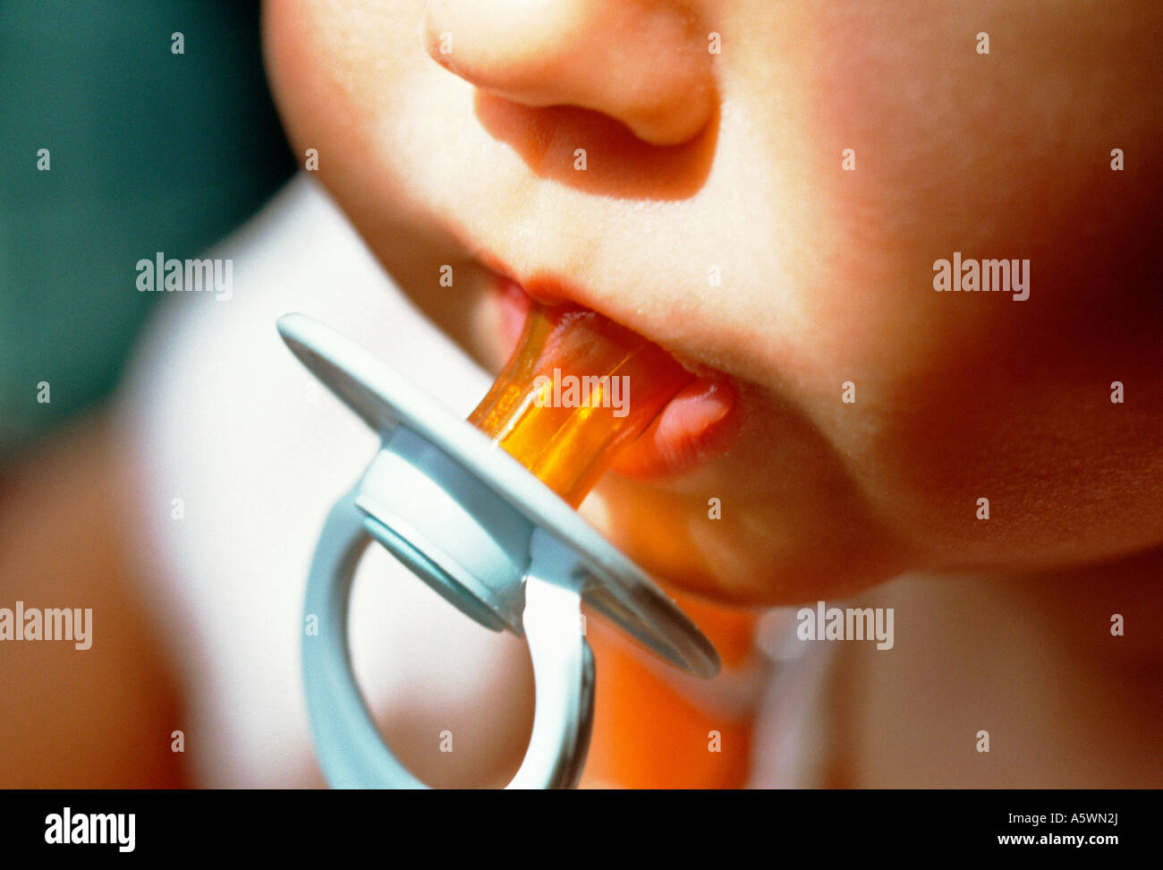 Baby with Pacifier Stock Photo