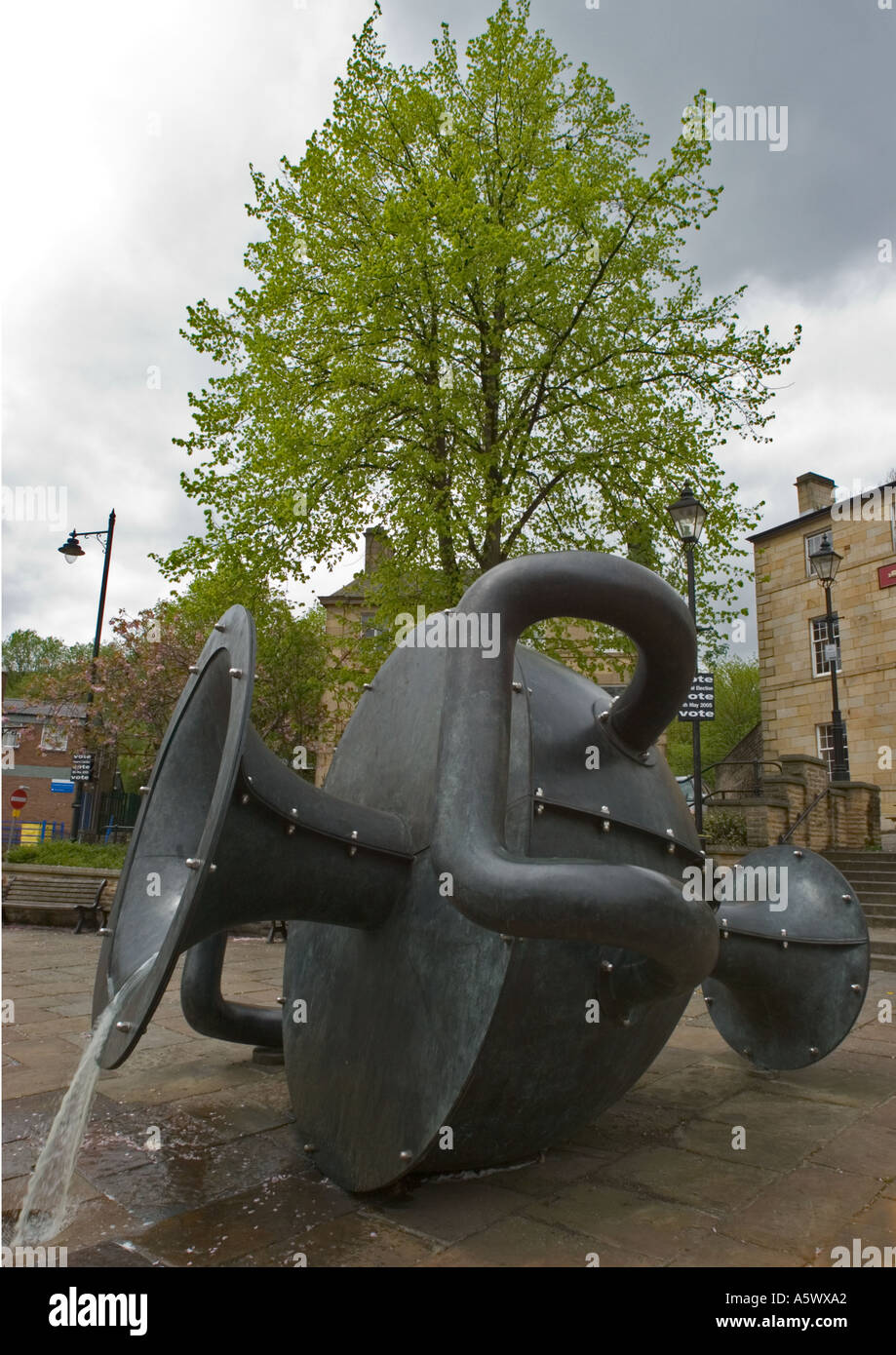 Tilted vase metal sculpture created by Edward Allington on the Irwell ...