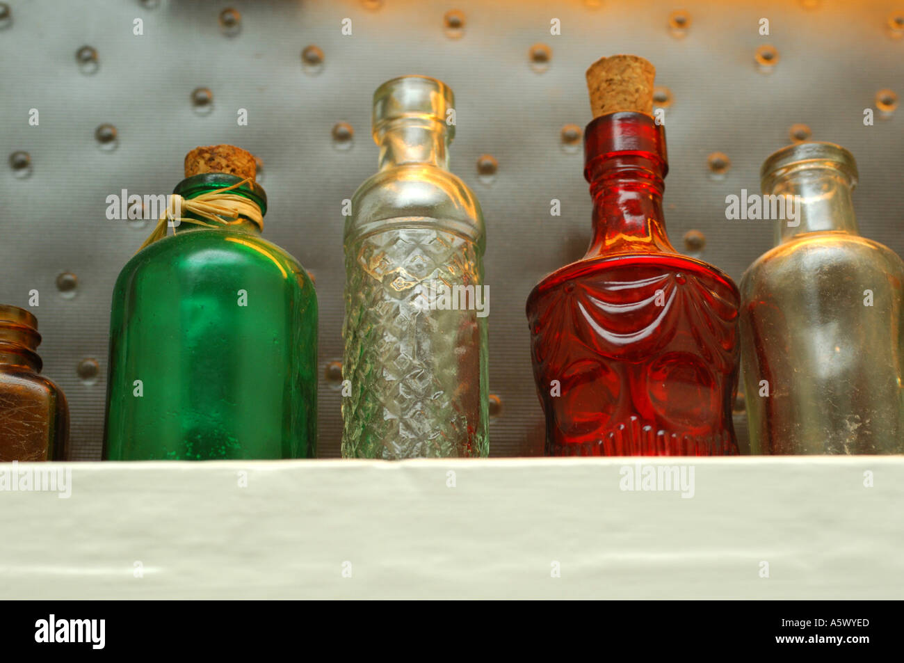 Vintage Bottles on a shelf Stock Photo