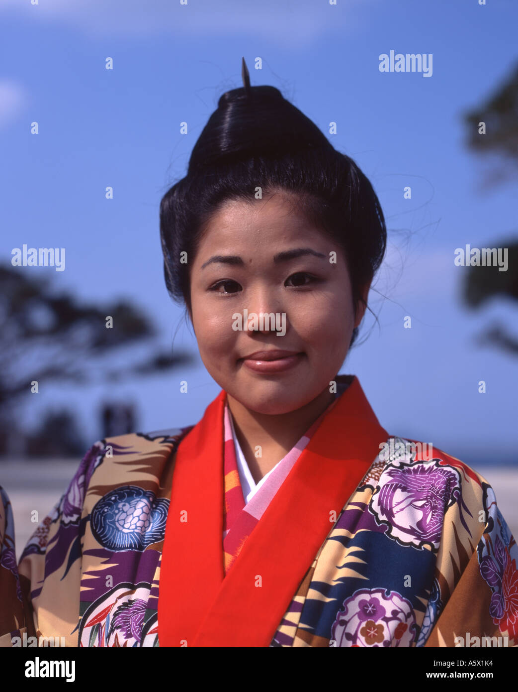 Young Okinawan woman in traditional costume and hairstyle Stock Photo