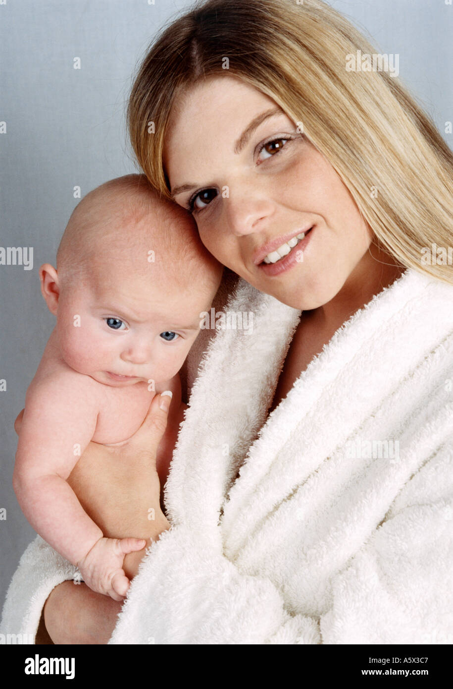 Portrait of a Mother and Her Baby Stock Photo
