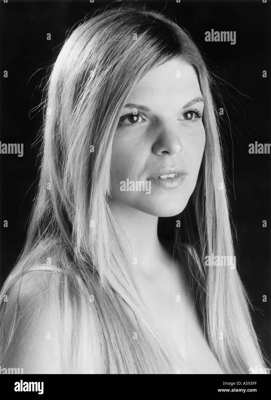 Black and White Portrait of a Blonde Caucasian Girl Stock Photo
