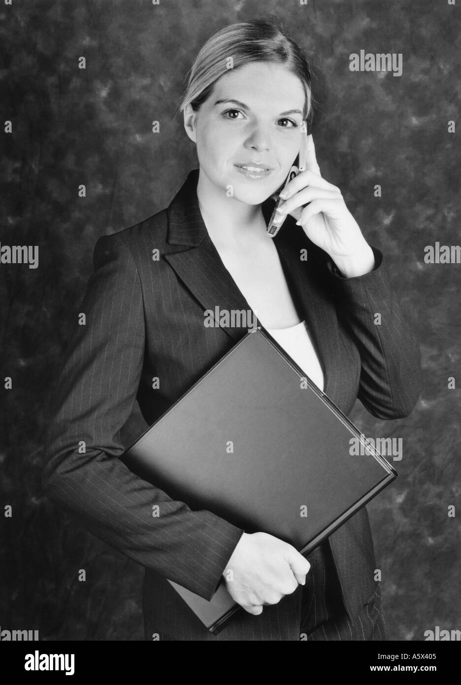 Young Business Woman Talking on the Telephone Stock Photo