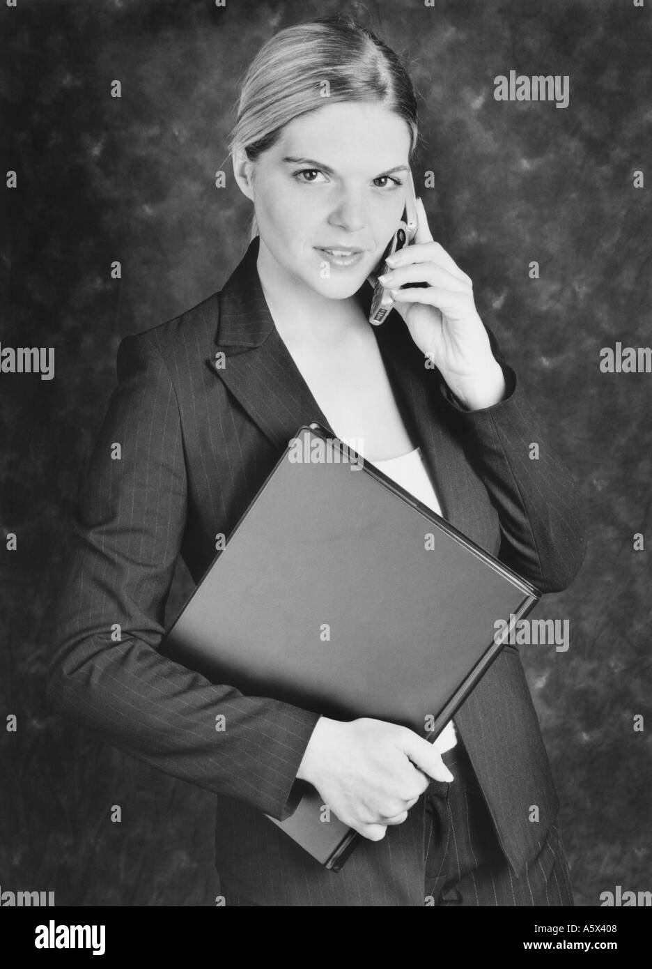 Young Business Woman Talking on the Telephone Stock Photo