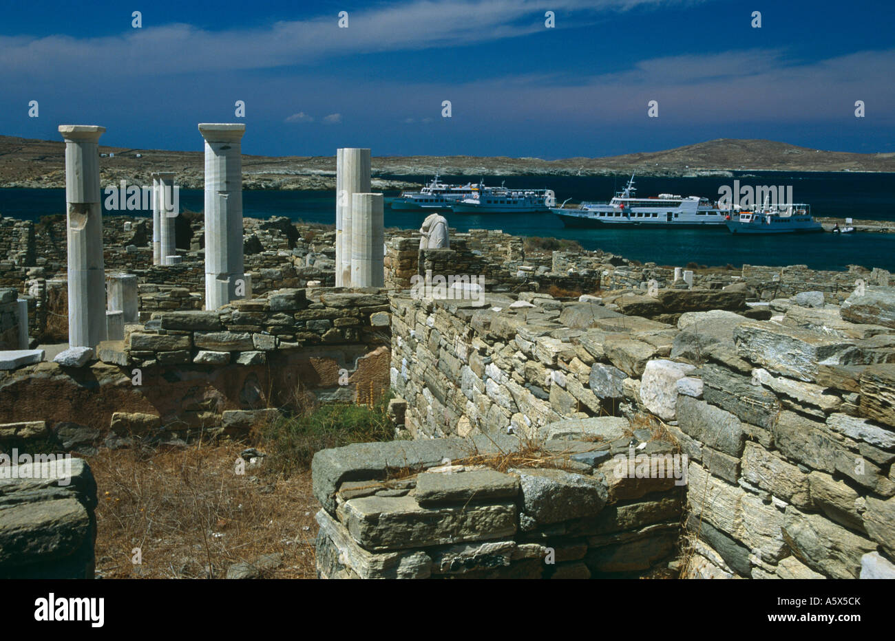 The House of Cleopatra and Boats in the Harbour, Archaeological Museum, Delos, near Mykonos, the Cyclades, Greek Islands, Greece Stock Photo