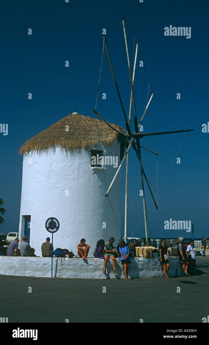 Tourists by the Quayside Windmill in Paroikia, Paros, the Cyclades ...