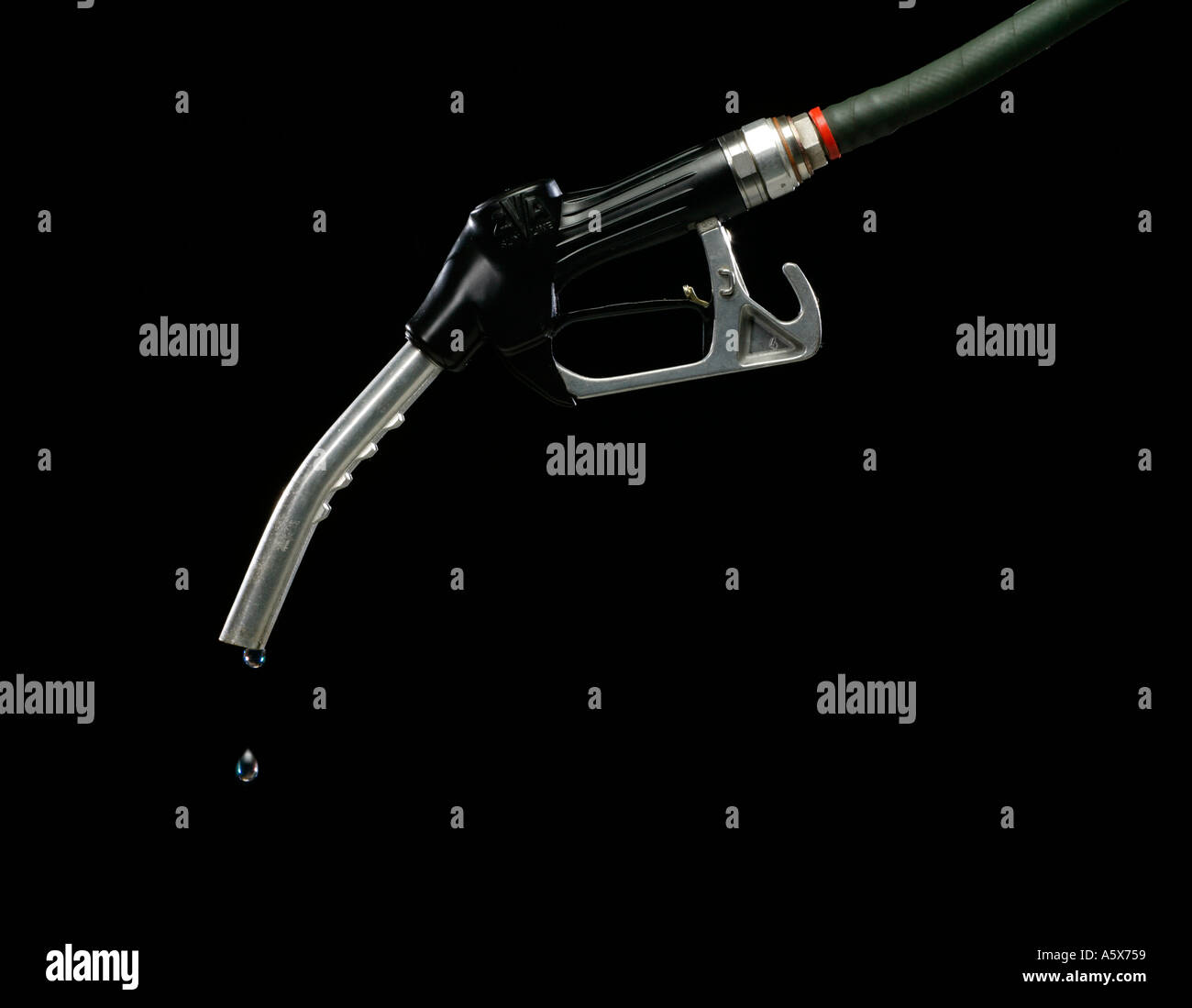 GAS PUMP WITH SINGLE DROP OF FUEL ON BLACK BACKGROUND Stock Photo Alamy