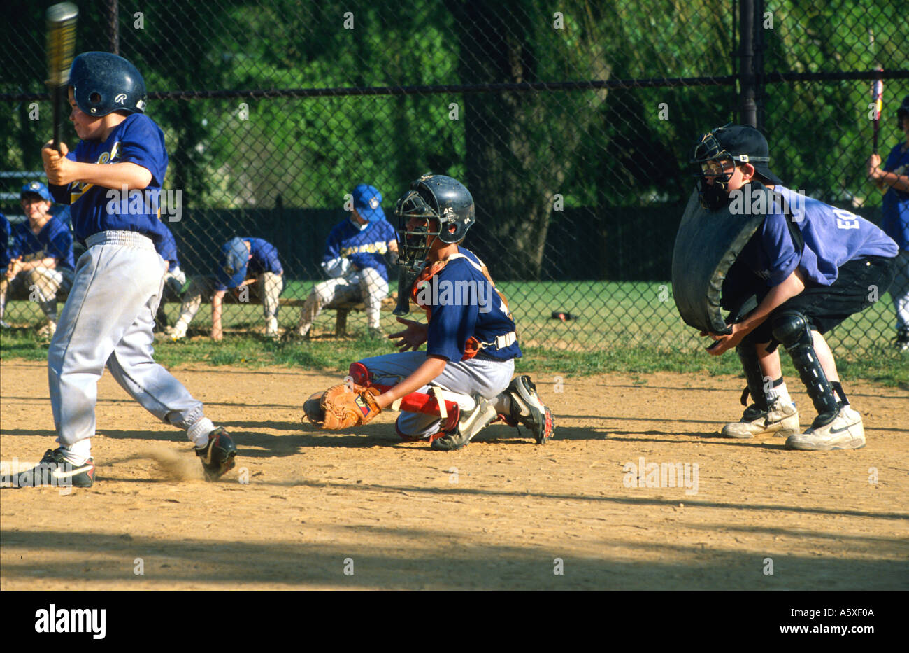 Advertising poster for amateur baseball game shows batter and catcher at  home plate Stock Photo - Alamy