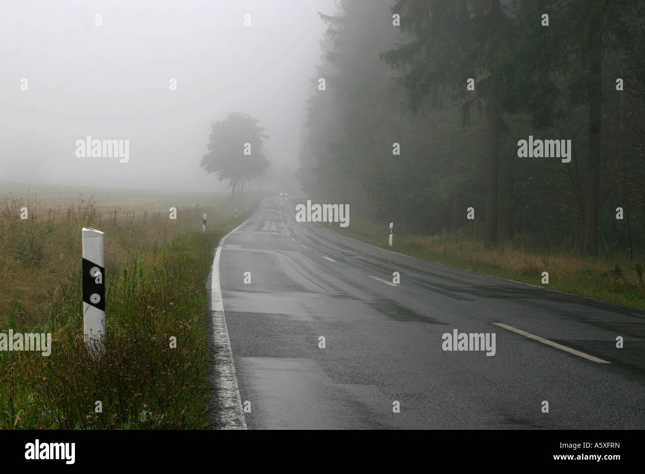 Rainy rural road Stock Photo