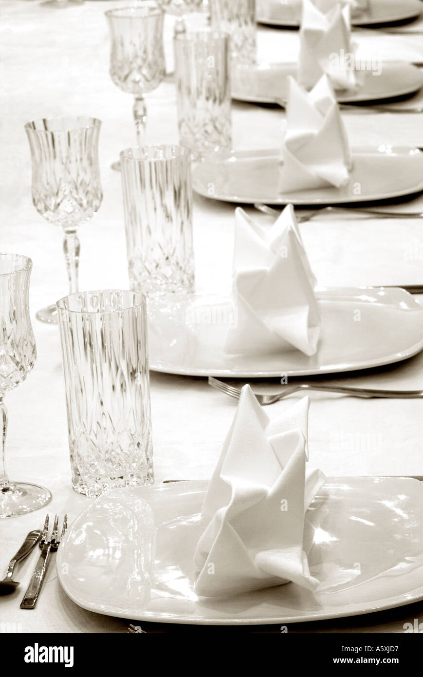 Place Settings on a Dinner Table Stock Photo