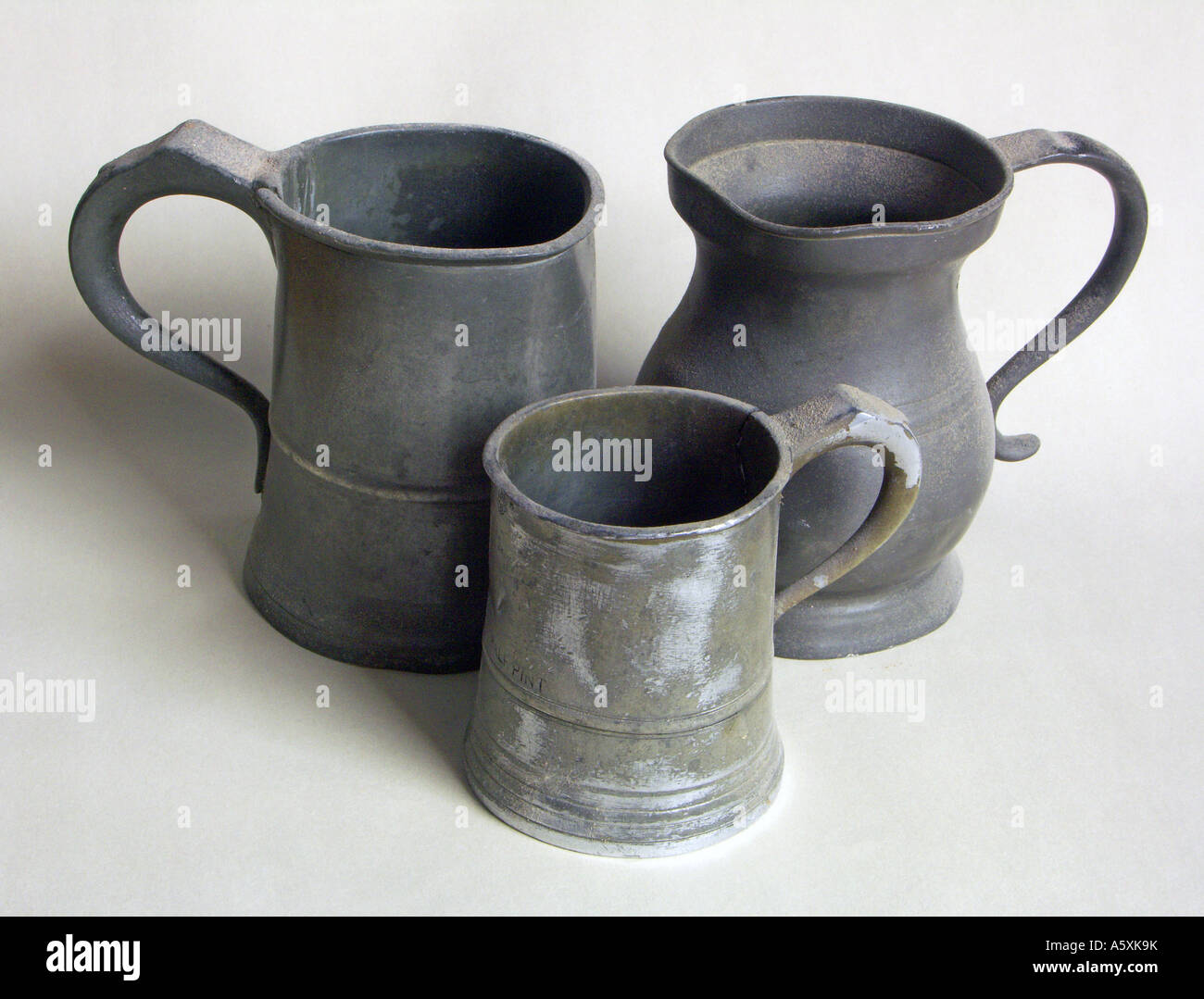 Three pewter tankards Stock Photo Alamy