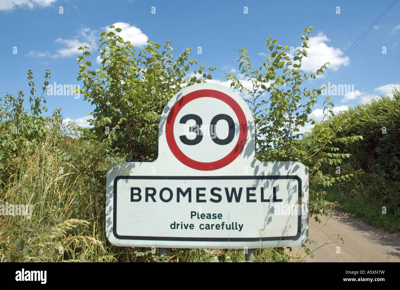 30 mile speed limit road sign approaching the village of Bromeswell Suffolk UK Stock Photo