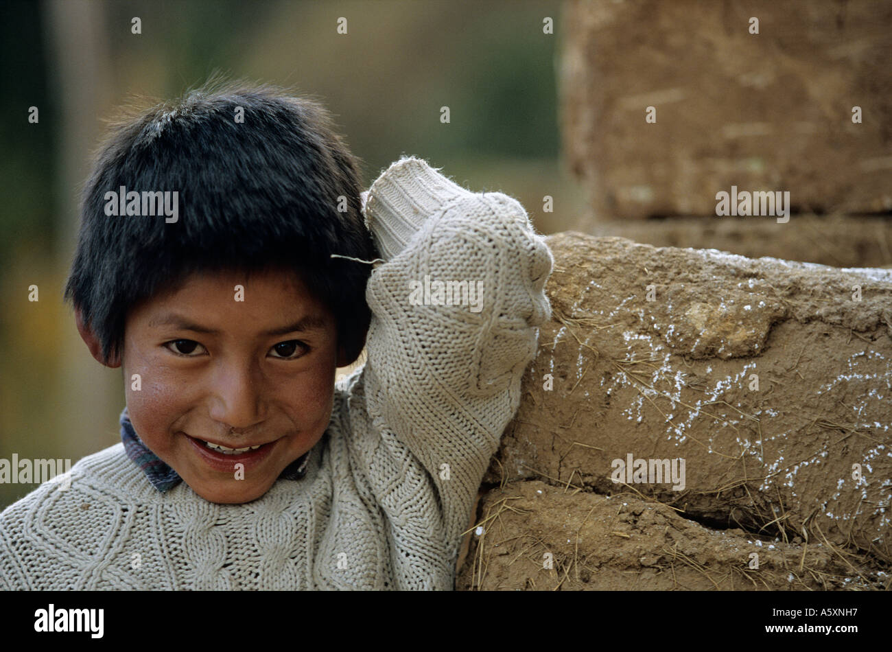 In a suburb of Cuzco, photograph of a kid . Portrait d'un gamin de la banlieue de Cuzco (Pérou). Stock Photo