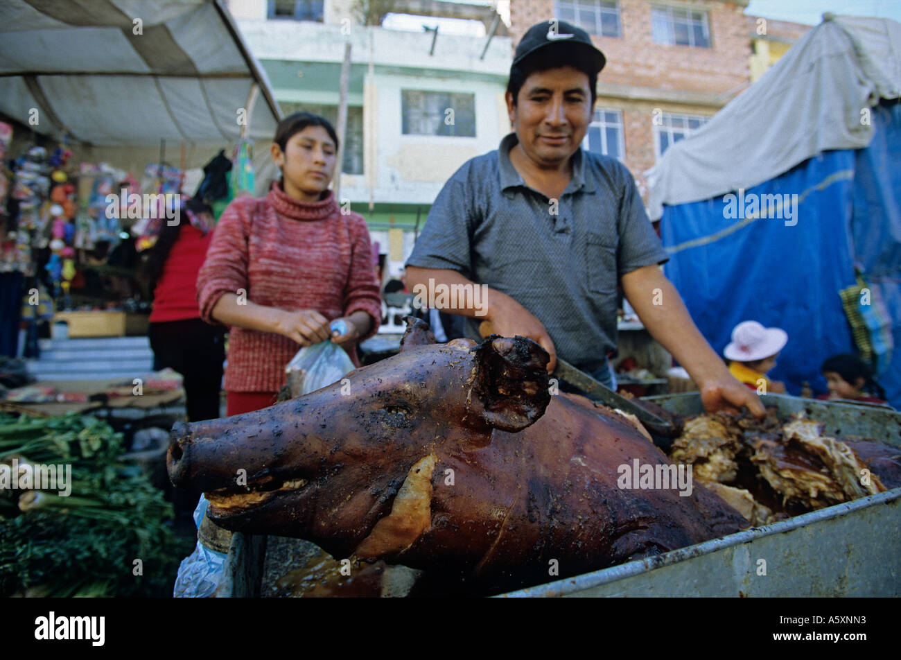 A grilled pig (Sus scrofa domesticus) on the market of Huaraz (Peru). Cochon grillé sur le marché de Huaraz (Pérou). Stock Photo