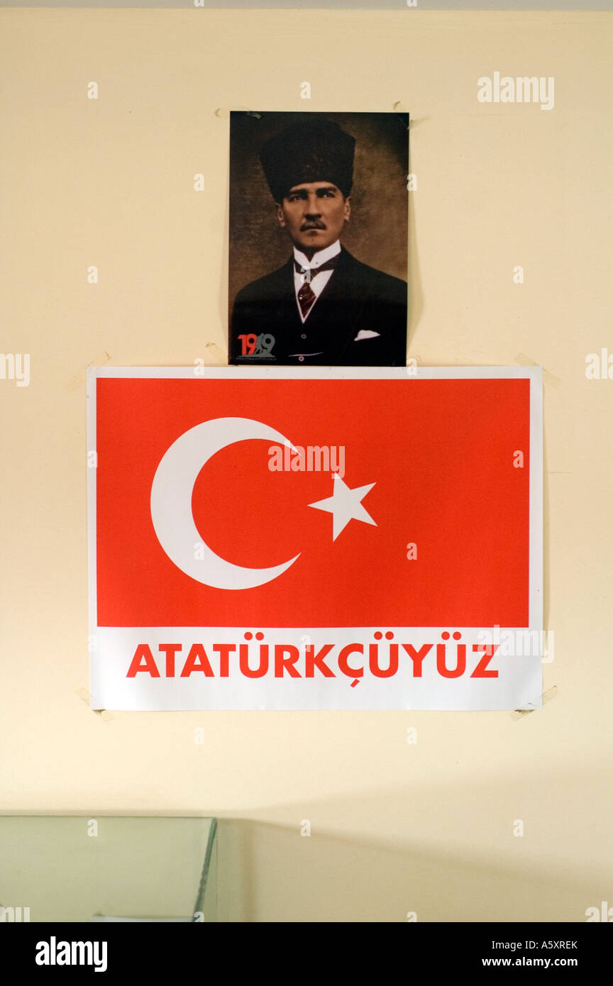 Portrait of Mustafa Kemal Ataturk above a Turkish flag, in a small museum on the Gallipoli peninsula, Turkey. Stock Photo