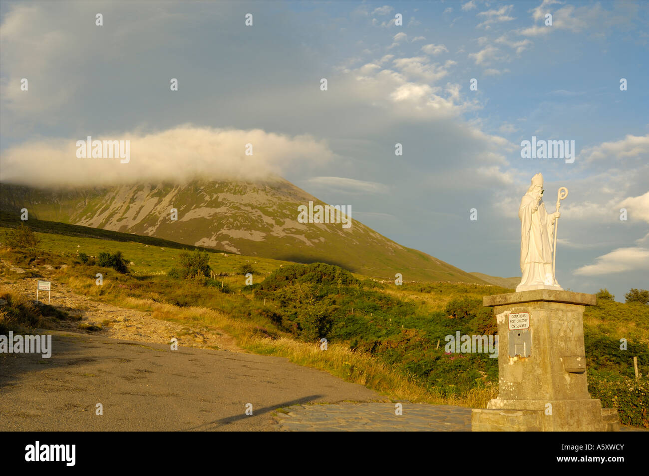 Statue of St Patrick at the base of Croagh Patrick mountain, County Mayo, Ireland Stock Photo