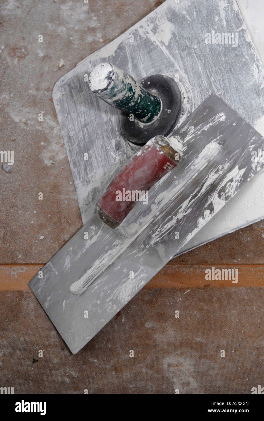 Trowel and mortar board on a construction site Stock Photo Alamy