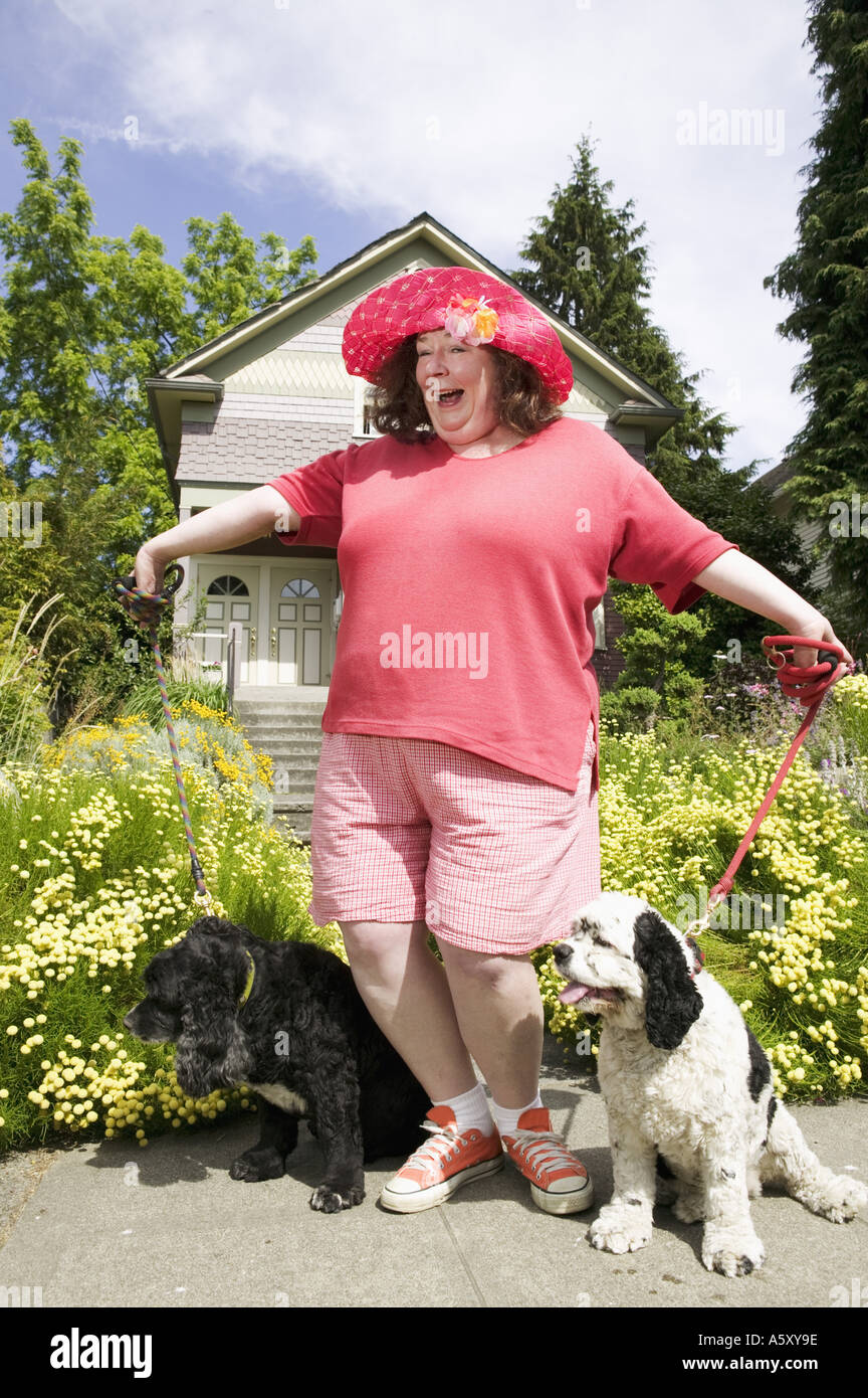 Woman posing with Cocker Spaniels Stock Photo