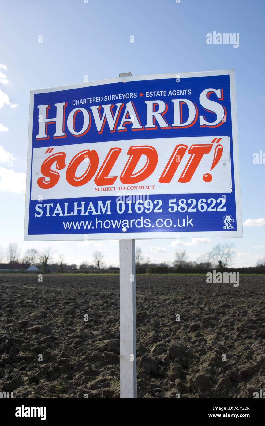 Estate Agent Sold Sign in Field Stock Photo Alamy