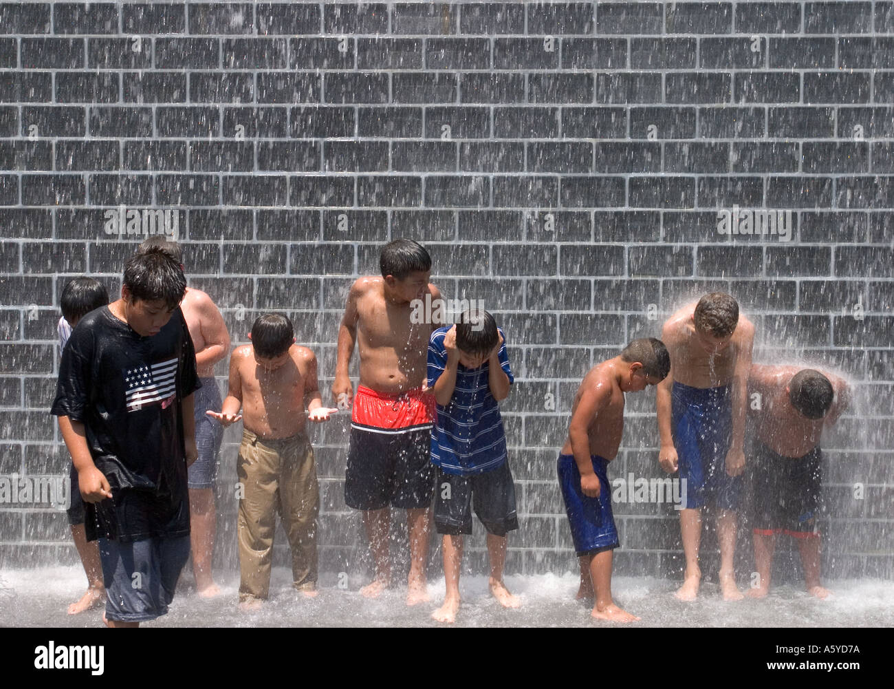 Children playing in Crown Fountain Millennium Park Chicago Illinois USA Stock Photo