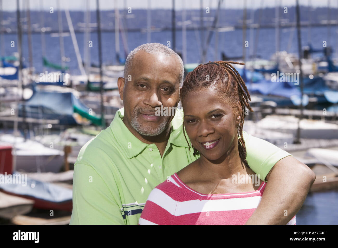 Portrait of couple at marina Stock Photo