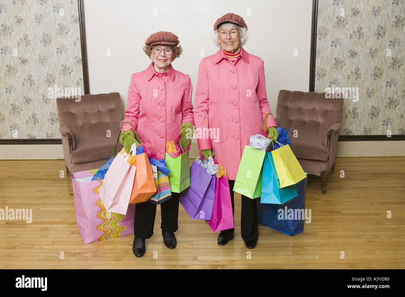 Senior women holding many shopping bags Stock Photo