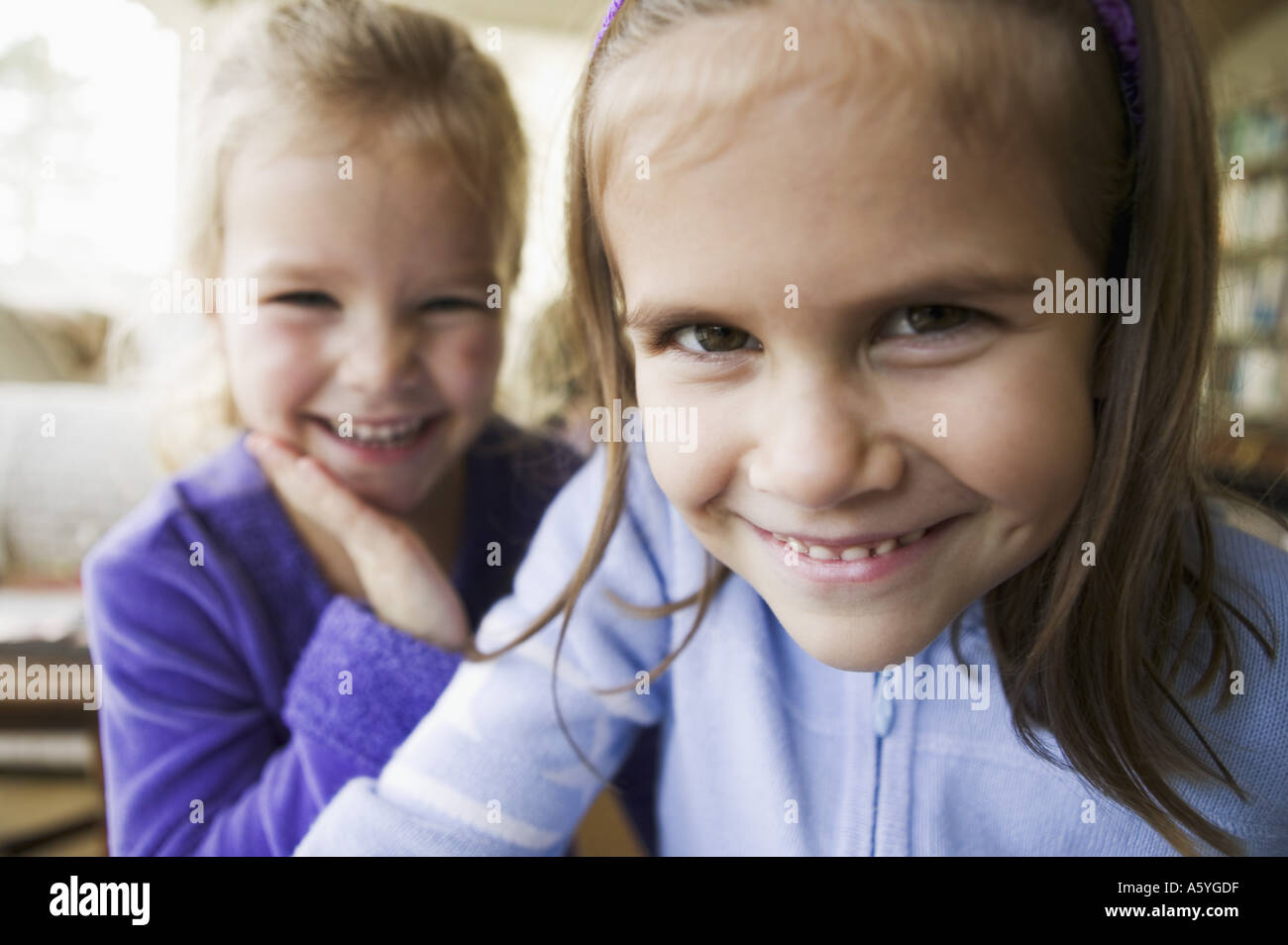 Girls laughing together Stock Photo