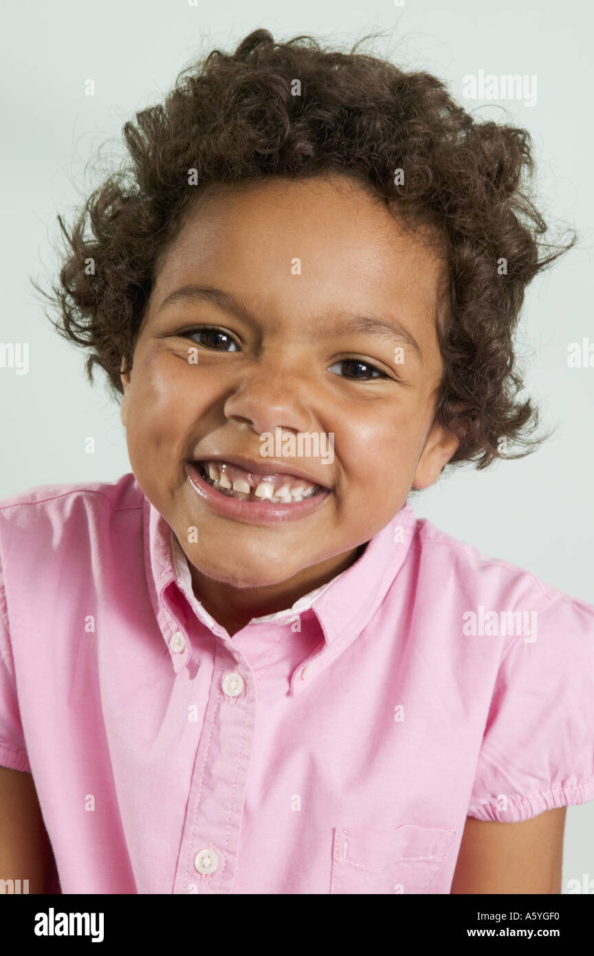 Portrait of girl smiling at camera Stock Photo - Alamy