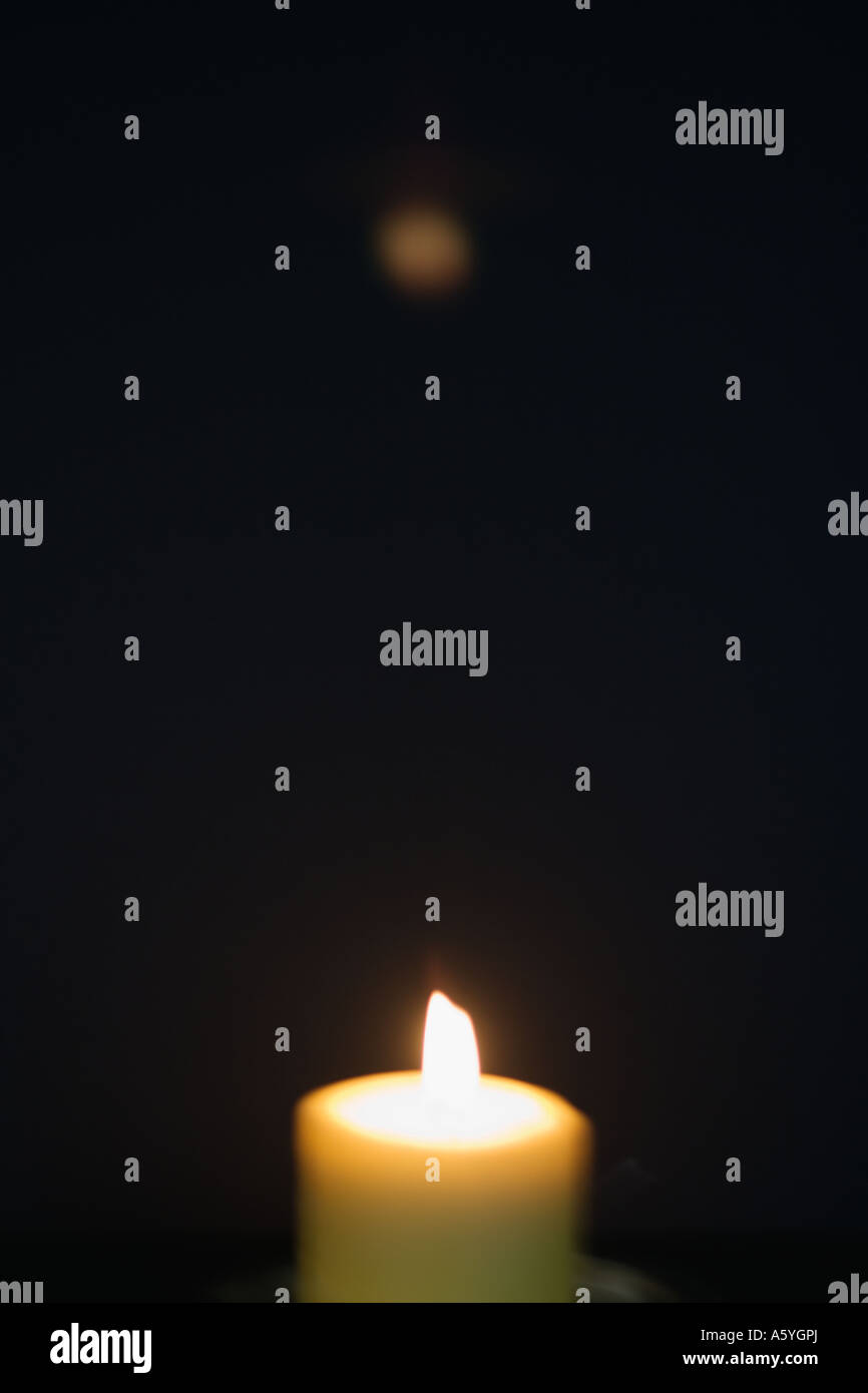 Close-up of a burning candle Stock Photo - Alamy