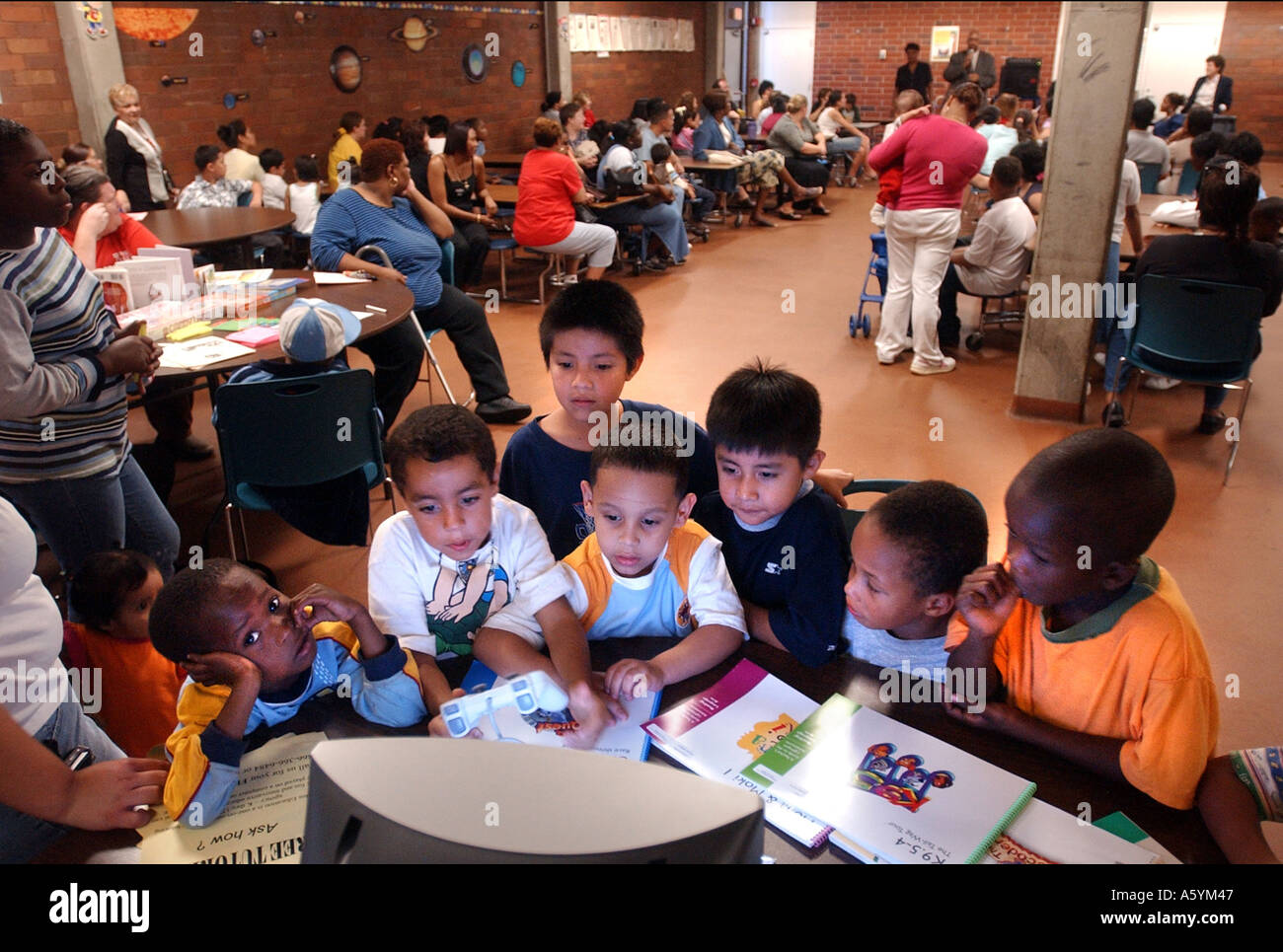 School children using game educational software Stock Photo
