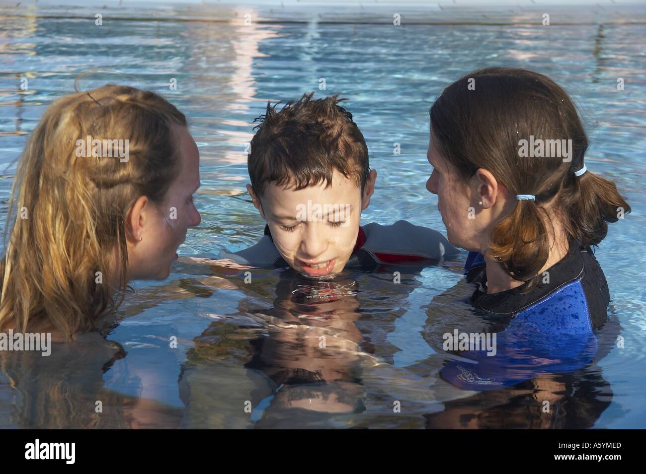 water therapy with handicapped child Stock Photo Alamy