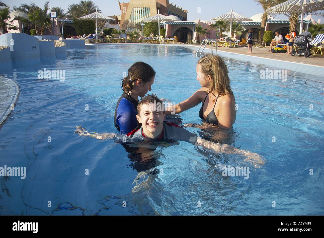 water therapy with handicapped child Stock Photo Alamy