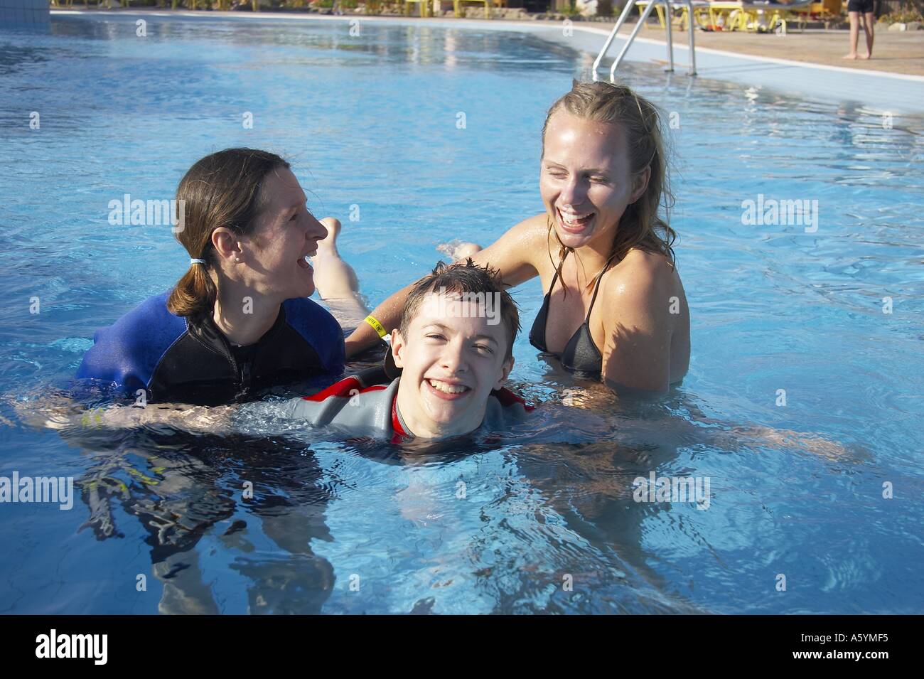 water therapy with handicapped child Stock Photo Alamy