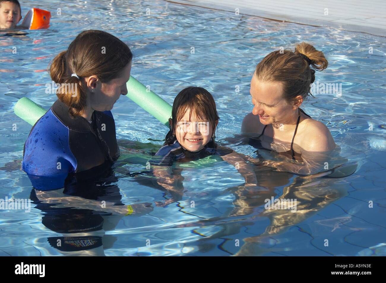 water therapy with handicapped child Stock Photo Alamy